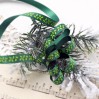 Green satin ribbon with holly