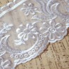 Embroidered lace on monofilament - widh 11cm - white - 1 meter